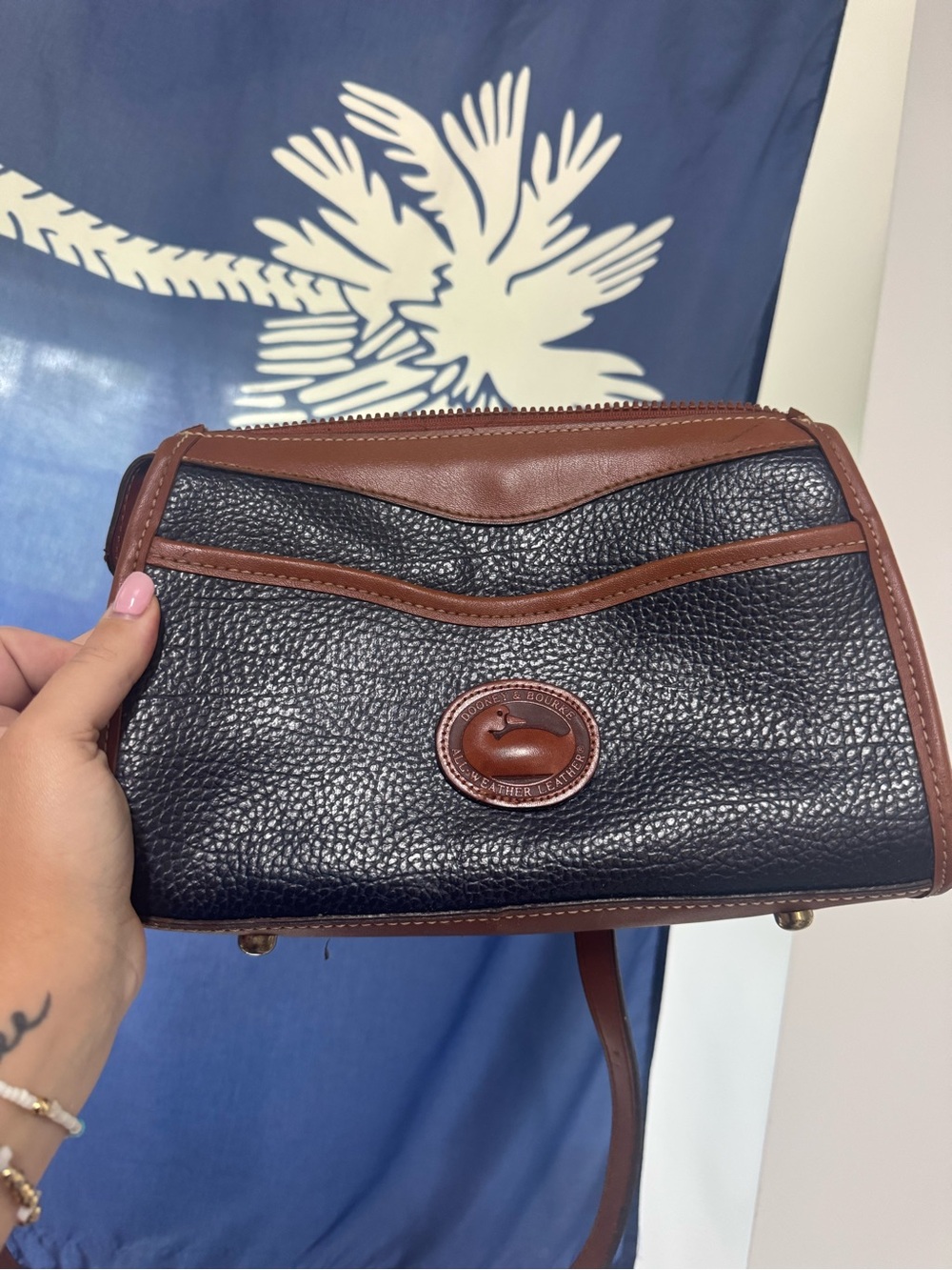 Dooney & Bourke Navy Pebbled Leather Messenger with Brown Trim